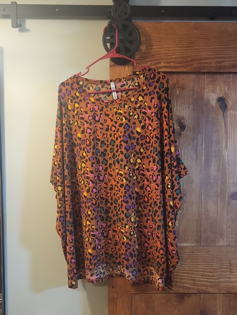 Dear Scarlett Rust Leopard Print Dolman Tunic with Multicolor Spots